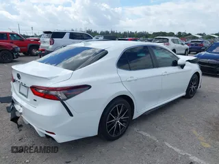 2022 Toyota Camry SE with VIN 4T1G11AK9NU659417, listed as a IAAI auction lot 41733094 with 74,054 mi miles. Bid and sale history available at carsss.com. Image 4.