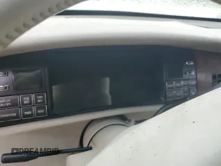 1995 Cadillac Concours z VIN 1G6KF52Y6SU244970, wystawiony jako Copart lot #75079524 z przebiegiem Nie podano mil oraz Szkody całkowita. Historia ofert i sprzedaży dostępna na DreamBid. Obrazek 9.