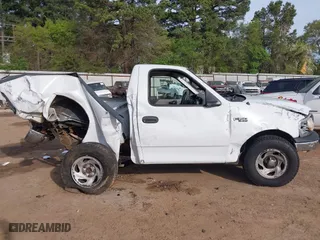 1999 Ford F-150 Work Series with VIN 1FTZF1728XKA04105, listed as a IAAI auction lot 41856047 with 176,890 mi miles. Bid and sale history available at carsss.com. Image 15.