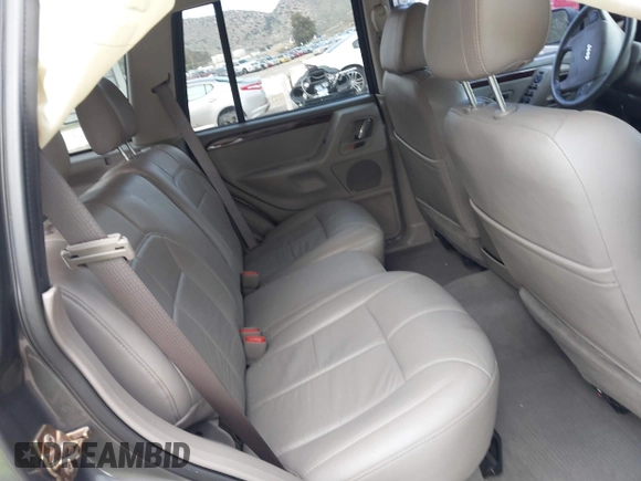 2004 Jeep Grand Cherokee Limited with VIN 1J8GX58N34C360819, listed as a IAAI auction lot 41816348 with 144,609 mi miles and . Bid and sale history available at DreamBid. Image 8.