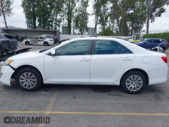 2014 Toyota Camry L with VIN 4T1BF1FK4EU403013, listed as a IAAI auction lot 42115089 with 221,686 mi miles and . Bid and sale history available at DreamBid. Image 14.