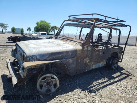2000 Jeep Wrangler SE with VIN 1J4FA29P2YP797531, listed as a Copart auction lot 56058845 with Not provided miles and Salvage title. Bid and sale history available at DreamBid. Image 1.