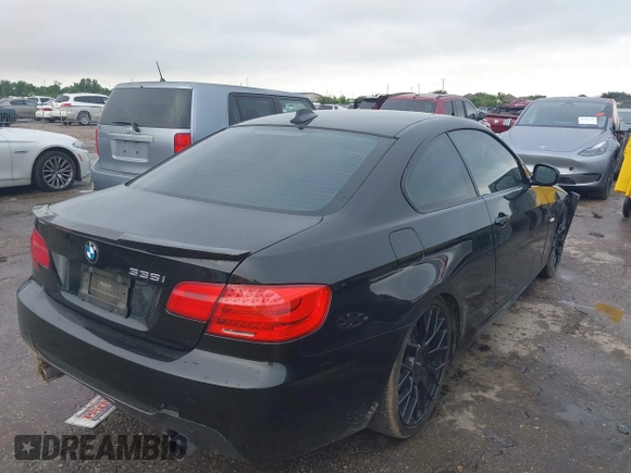 2012 BMW 3 Series 335i with VIN WBAKG7C5XCE802399, listed as a IAAI auction lot 42210396 with 141,502 mi miles and . Bid and sale history available at DreamBid. Image 4.