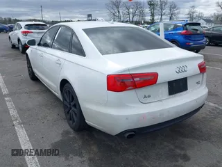 2013 Audi A6 Premium Plus with VIN WAUGGAFCXDN124879, listed as a IAAI auction lot 42041791 with 162,388 mi miles and . Bid and sale history available at DreamBid. Image 3.