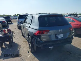 2020 Volkswagen Tiguan SE with VIN 3VV3B7AXXLM137641, listed as a IAAI auction lot 41830400 with 68,067 mi miles and . Bid and sale history available at DreamBid. Image 3.