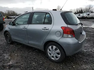 2009 Toyota Yaris with VIN JTDKT903095238977, listed as a Copart auction lot 46437355 with 181,452 mi miles and Salvage Title. Bid and sale history available at carsss.com. Image 2.
