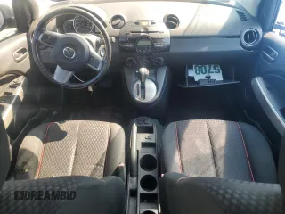 2013 Mazda 2 Touring z VIN JM1DE1LZ7D0153662, wystawiony jako Copart lot #58562435 z przebiegiem 109 329 mil mil oraz Szkoda całkowita • Salvage title. Historia ofert i sprzedaży dostępna na DreamBid. Obrazek 8.
