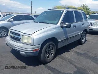 2002 Chevrolet Tracker z VIN 2CNBE13C426951703, wystawiony jako IAAI lot #42177942 z przebiegiem 186 096 mil mil oraz . Historia ofert i sprzedaży dostępna na DreamBid. Obrazek 6.