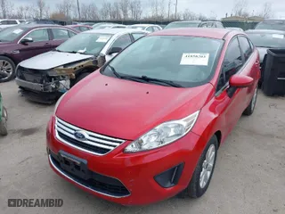 2012 Ford Fiesta SE with VIN 3FADP4BJ2CM158678, listed as a IAAI auction lot 41858203 with 144,458 mi miles. Bid and sale history available at carsss.com. Image 6.