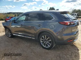 2017 Mazda CX-9 Grand Touring z VIN JM3TCADY8H0138866, wystawiony jako Copart lot #80894184 z przebiegiem Nie podano mil oraz Szkoda całkowita • Salvage title. Historia ofert i sprzedaży dostępna na DreamBid. Obrazek 2.