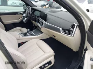2022 BMW X5 sDrive40i with VIN 5UXCR4C09N9M22050, listed as a IAAI auction lot 41573419 with 33,574 mi miles. Bid and sale history available at carsss.com. Image 5.
