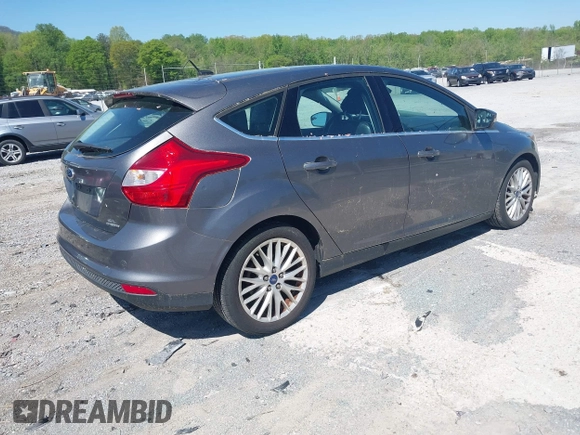 2012 Ford Focus SEL with VIN 1FAHP3M27CL399204, listed as a IAAI auction lot 41980976 with 113,443 mi miles. Bid and sale history available at carsss.com. Image 4.