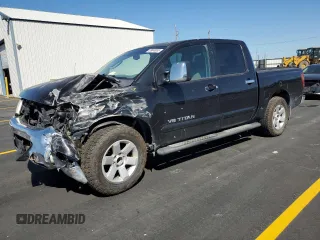 2005 Nissan Titan LE with VIN 1N6AA07A15N514446, listed as a Copart auction lot 59046855 with 264,222 mi miles and Salvage title. Bid and sale history available at DreamBid. Image 1.