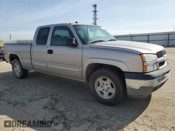 2005 Chevrolet Silverado 1500 LS z VIN 1GCEK19T55E193176, wystawiony jako Copart lot #52181185 z przebiegiem 418 180 mil mil oraz Czysty tytuł • Clean title. Historia ofert i sprzedaży dostępna na DreamBid. Obrazek 4.