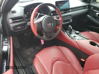2022 Toyota GR Supra 3.0 with VIN WZ1DB0C06NW052360, listed as a Copart auction lot 79056304 with 12,060 mi miles and Salvage Title. Bid and sale history available at carsss.com. Image 8.