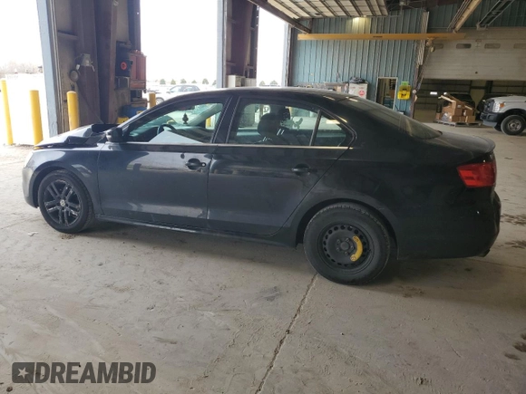 2013 Volkswagen Jetta SE with VIN 3VWDX7AJXDM427263, listed as a Copart auction lot 52502585 with 243,457 mi miles and Salvage title. Bid and sale history available at DreamBid. Image 2.