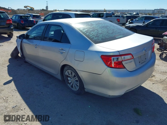 2014 Toyota Camry L with VIN 4T1BF1FK7EU856848, listed as a IAAI auction lot 41729604 with 100,148 mi miles. Bid and sale history available at carsss.com. Image 3.