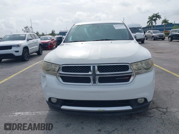 2013 Dodge Durango SXT with VIN 1C4RDHAG1DC669503, listed as a IAAI auction lot 42614210 with 103,482 mi miles and . Bid and sale history available at DreamBid. Image 12.