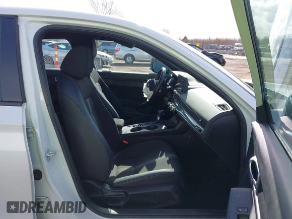 2022 Honda Civic Sport z VIN 2HGFE2F57NH547586, wystawiony jako IAAI lot #41706759 z przebiegiem 33 826 mil mil oraz . Historia ofert i sprzedaży dostępna na DreamBid. Obrazek 5.