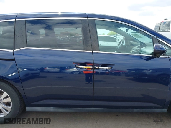 2017 Honda Odyssey SE with VIN 5FNRL5H30HB025472, listed as a IAAI auction lot 42212081 with 33,557 mi miles and . Bid and sale history available at carsss.com. Image 14.