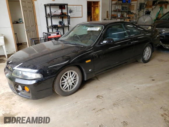 1997 Nissan Skyline z VIN HR33101590, wystawiony jako Copart lot #68650354 z przebiegiem 76 082 mil mil oraz Szkoda całkowita • Salvage title. Historia ofert i sprzedaży dostępna na DreamBid. Obrazek 1.