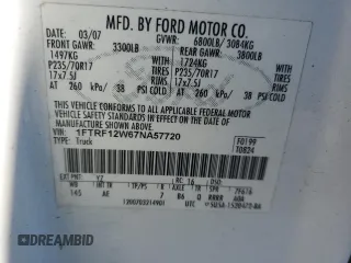 2007 Ford F-150 XL with VIN 1FTRF12W67NA57720, listed as a Copart auction lot 84616654 with 160,980 mi miles and Salvage Title. Bid and sale history available at carsss.com. Image 12.