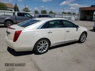 2014 Cadillac XTS Luxury z VIN 2G61M5S33E9193905, wystawiony jako Copart lot #55479605 z przebiegiem 143 006 mil mil oraz Szkoda całkowita • Salvage title. Historia ofert i sprzedaży dostępna na DreamBid. Obrazek 3.