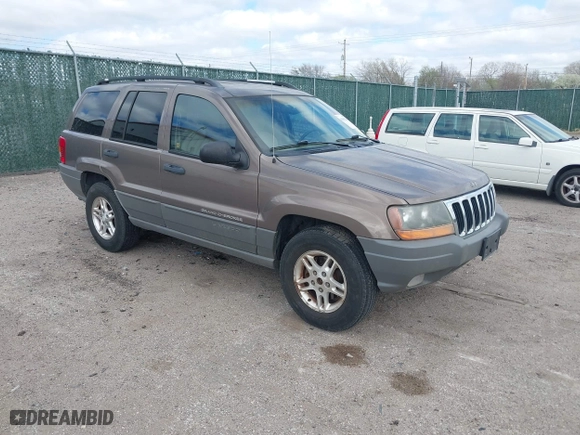 2002 Jeep Grand Cherokee Laredo with VIN 1J4GW48S32C123720, listed as a IAAI auction lot 41909204 with 157,996 mi miles. Bid and sale history available at carsss.com. Image 1.