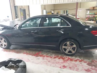 2016 Mercedes-Benz E-Class E 350 Luxury with VIN WDDHF8JB4GB178501, listed as a IAAI auction lot 41043310 with 126,903 mi miles. Bid and sale history available at carsss.com. Image 14.