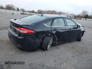 2017 Ford Fusion SE z VIN 3FA6P0HD1HR312200, wystawiony jako Copart lot #82823184 z przebiegiem Nie podano mil oraz Szkoda całkowita • Salvage title. Historia ofert i sprzedaży dostępna na DreamBid. Obrazek 3.