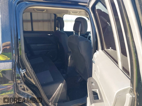 2014 Jeep Patriot Altitude with VIN 1C4NJPBA7ED534498, listed as a IAAI auction lot 40634890 with 115,330 mi miles and . Bid and sale history available at DreamBid. Image 8.