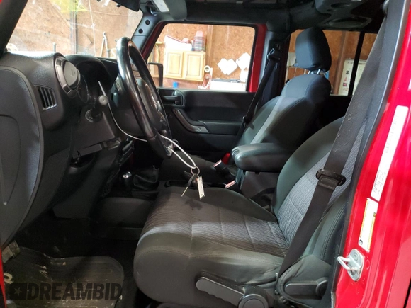 2012 Jeep Wrangler Unlimited Sport z VIN 1C4HJWDG2CL117124, wystawiony jako Copart lot #57288435 z przebiegiem 134 860 mil mil oraz Czysty tytuł • Clean title. Historia ofert i sprzedaży dostępna na DreamBid. Obrazek 7.
