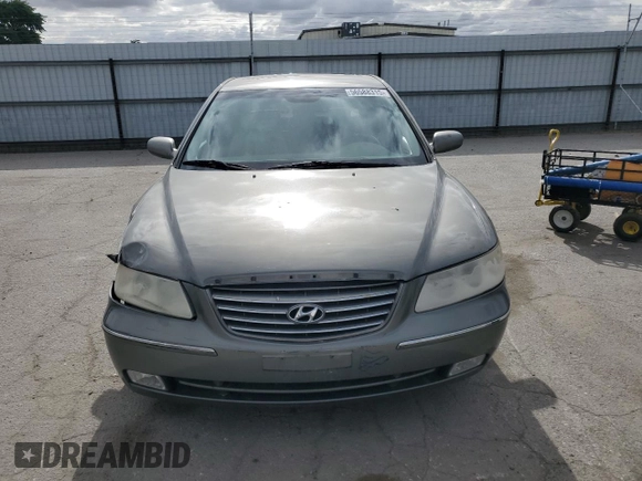 2006 Hyundai Azera SE z VIN KMHFC46F76A054625, wystawiony jako Copart lot #56588315 z przebiegiem 178 667 mil mil oraz Szkoda całkowita • Salvage title. Historia ofert i sprzedaży dostępna na DreamBid. Obrazek 5.