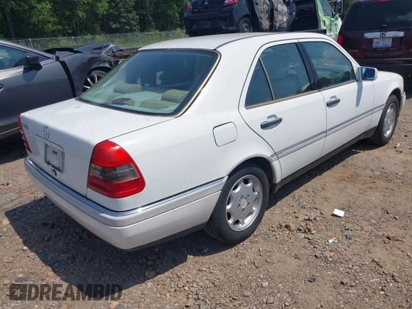 1997 Mercedes-Benz C with VIN WDBHA23E2VF504829, listed as a IAAI auction lot 42690662 with 266,074 mi miles and . Bid and sale history available at DreamBid. Image 4.