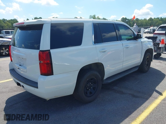 2018 Chevrolet Tahoe Commercial z VIN 1GNLCDEC1JR155210, wystawiony jako IAAI lot #42845068 z przebiegiem 159 456 mil mil oraz . Historia ofert i sprzedaży dostępna na DreamBid. Obrazek 4.