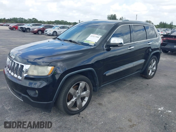 2012 Jeep Grand Cherokee Overland with VIN 1C4RJECT4CC299549, listed as a IAAI auction lot 41917306 with 229,256 mi miles. Bid and sale history available at carsss.com. Image 17.