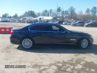 2011 BMW 7 Series 750Li xDrive with VIN WBAKC8C53BC433865, listed as a IAAI auction lot 41823357 with 122,476 mi miles. Bid and sale history available at carsss.com. Image 13.
