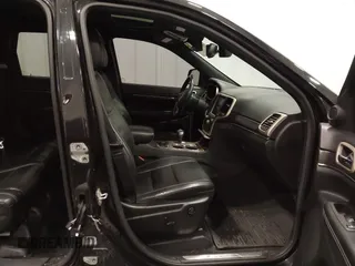 2014 Jeep Grand Cherokee Limited with VIN 1C4RJFBG4EC182065, listed as a IAAI auction lot 42291900 with 131,868 mi miles and . Bid and sale history available at DreamBid. Image 5.