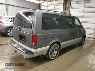 2000 Chevrolet Astro with VIN 1GNEL19WXYB140753, listed as a Copart auction lot 74493894 with 141,609 mi miles and Salvage Title. Bid and sale history available at carsss.com. Image 3.
