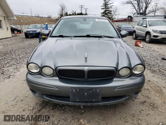 2004 Jaguar X-Type with VIN SAJEA51C24WE00125, listed as a Copart auction lot 49161875 with 80,890 mi miles and Clean Title. Bid and sale history available at DreamBid. Image 5.