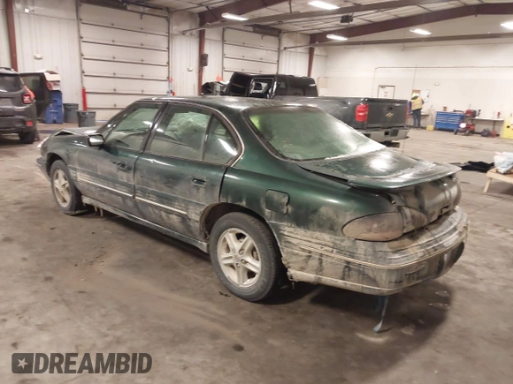 1997 Pontiac Bonneville SE z VIN 1G2HX52KXVH250272, wystawiony jako IAAI lot #41644041 z przebiegiem 160 791 mil mil oraz . Historia ofert i sprzedaży dostępna na DreamBid. Obrazek 3.