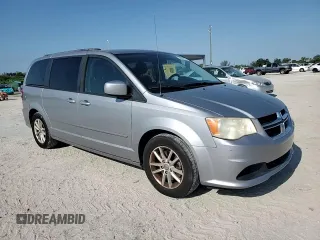 2014 Dodge Grand Caravan SXT z VIN 2C4RDGCG6ER223900, wystawiony jako Copart lot #56960965 z przebiegiem 101 275 mil mil oraz Szkoda całkowita • Salvage title. Historia ofert i sprzedaży dostępna na DreamBid. Obrazek 14.