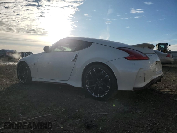 2016 Nissan 370Z z VIN JN1AZ4EH2GM935381, wystawiony jako Copart lot #83220624 z przebiegiem 56 907 mil mil oraz Szkoda całkowita • Salvage title. Historia ofert i sprzedaży dostępna na DreamBid. Obrazek 2.
