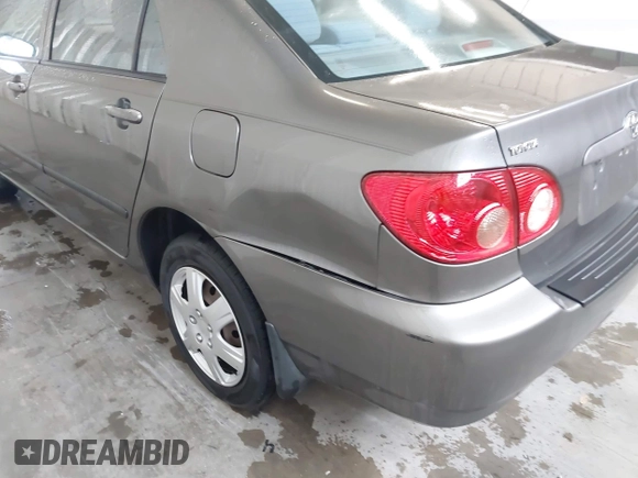 2007 Toyota Corolla CE z VIN 2T1BR32E87C749279, wystawiony jako IAAI lot #42654260 z przebiegiem 210 509 mil mil oraz . Historia ofert i sprzedaży dostępna na DreamBid. Obrazek 6.