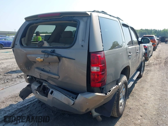 2007 Chevrolet Tahoe LTZ with VIN 1GNFK13077J130469, listed as a IAAI auction lot 42463054 with 126,266 mi miles and . Bid and sale history available at DreamBid. Image 4.