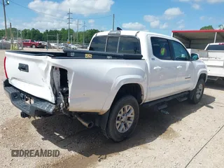 2017 Toyota Tacoma SR5 with VIN 5TFAZ5CN6HX035708, listed as a IAAI auction lot 42117129 with 122,100 mi miles and . Bid and sale history available at DreamBid. Image 4.