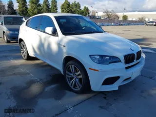 2012 BMW X6 M with VIN 5YMGZ0C59CLK14913, listed as a IAAI auction lot 41635362 with 137,979 mi miles. Bid and sale history available at carsss.com. Image 1.