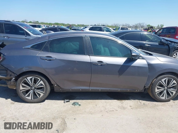 2016 Honda Civic EX-L with VIN 2HGFC1F77GH640323, listed as a IAAI auction lot 41969858 with Not provided miles and . Bid and sale history available at DreamBid. Image 12.