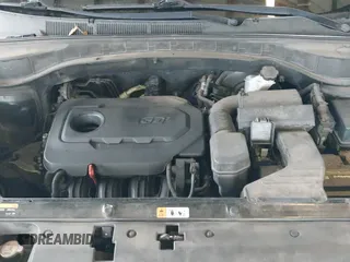 2017 Hyundai Santa Fe 2.4L z VIN 5NMZU3LB5HH025918, wystawiony jako IAAI lot #43323225 z przebiegiem 165 340 mil mil oraz . Historia ofert i sprzedaży dostępna na DreamBid. Obrazek 19.