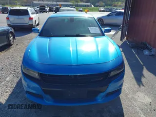 2015 Dodge Charger SXT with VIN 2C3CDXHG1FH866598, listed as a IAAI auction lot 41944761 with 201,163 mi miles and . Bid and sale history available at DreamBid. Image 12.